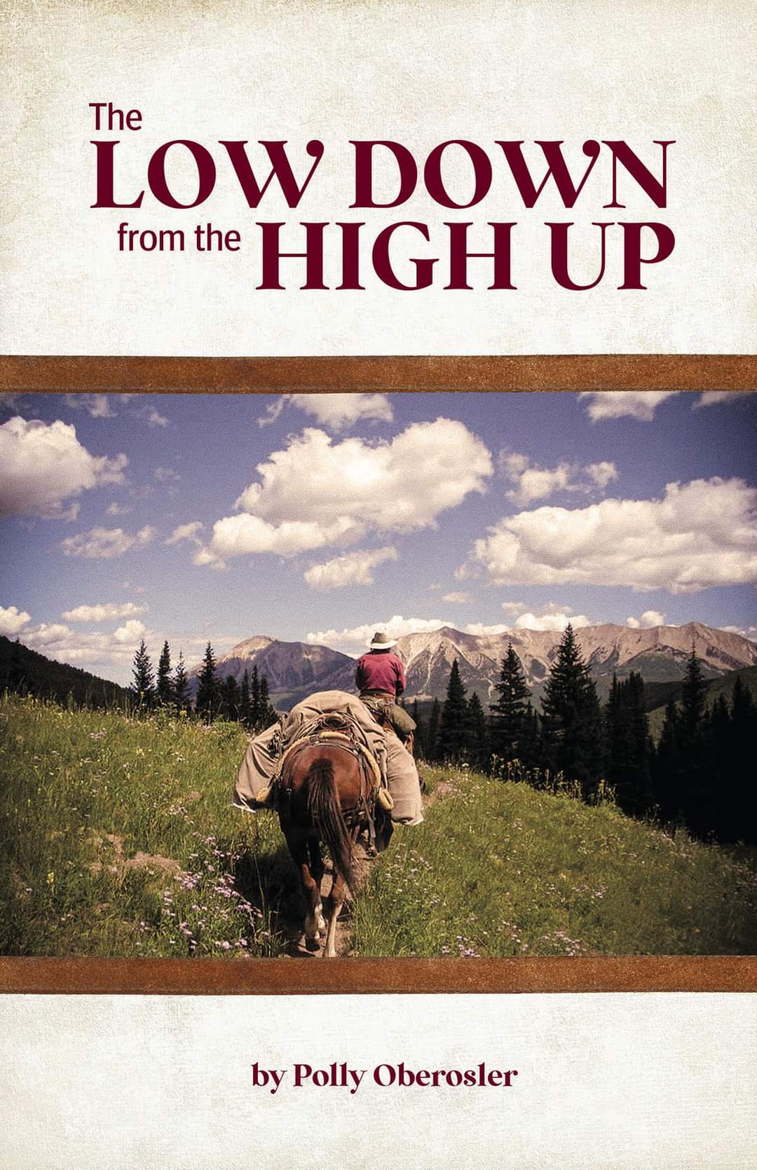 The Low Down from the High Up Front Cover with a photo of Polly on a trail in the mountains with her horse and pack mule.
